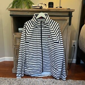 Polo rain/boating jacket has a hood that fold up and zips into the collar